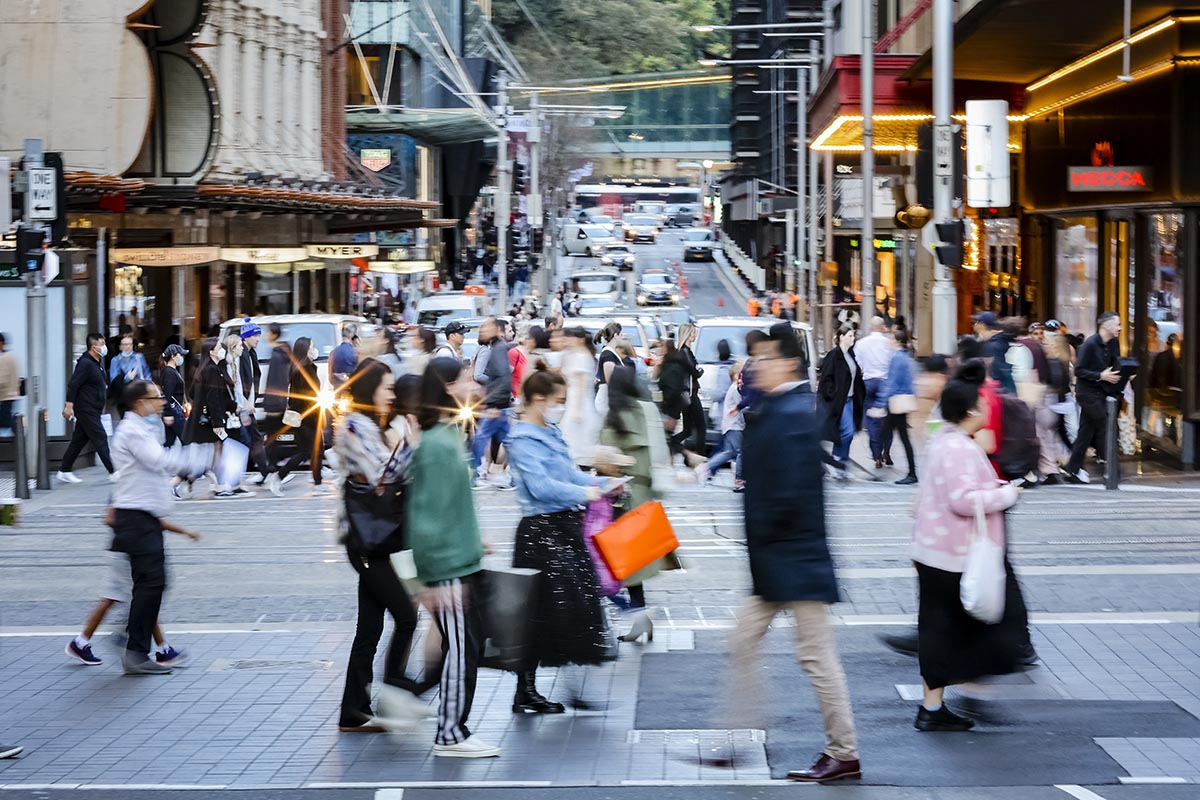People outside walking in the city
